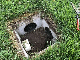 Completed French drain installation in residential yard